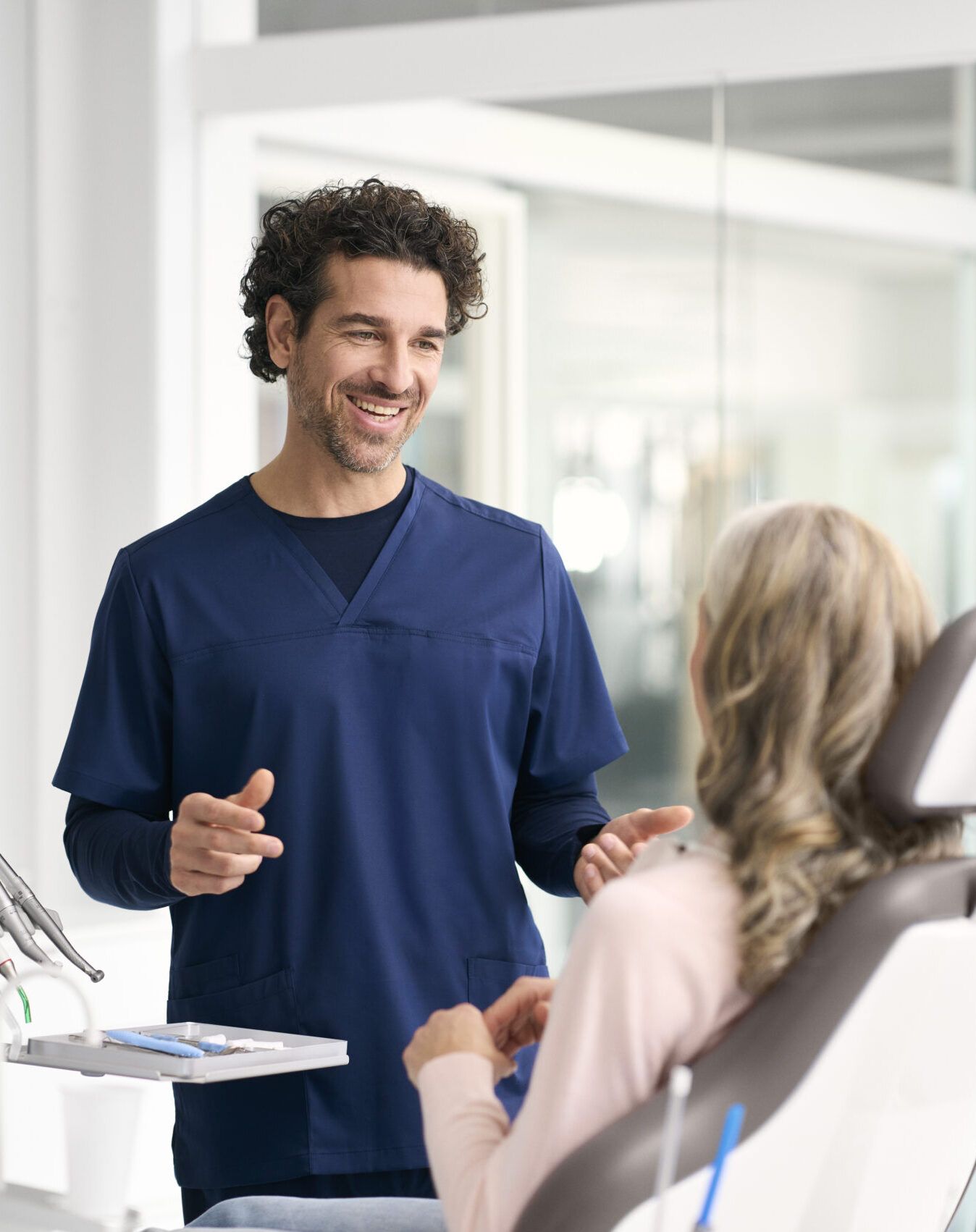 Conversation Male dentist female patient talking